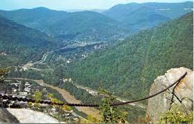 Chain attached to rock overlooking town of Pineville, KY